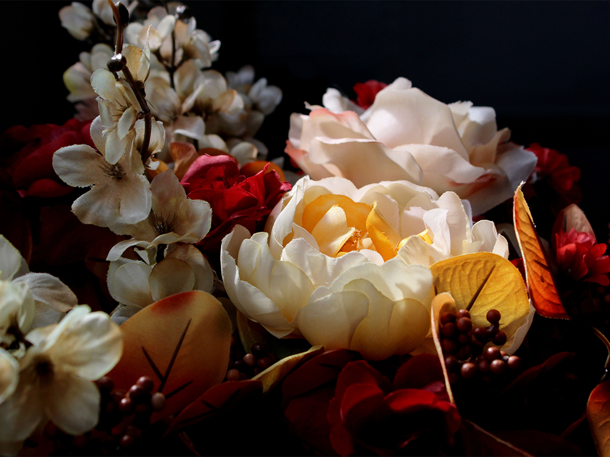 close up of autumn themed silk flower bouquet