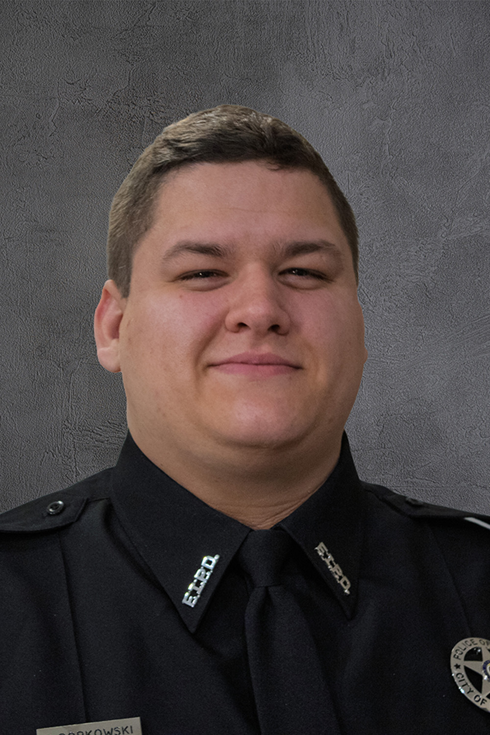 portrait of police officer in uniform smiling