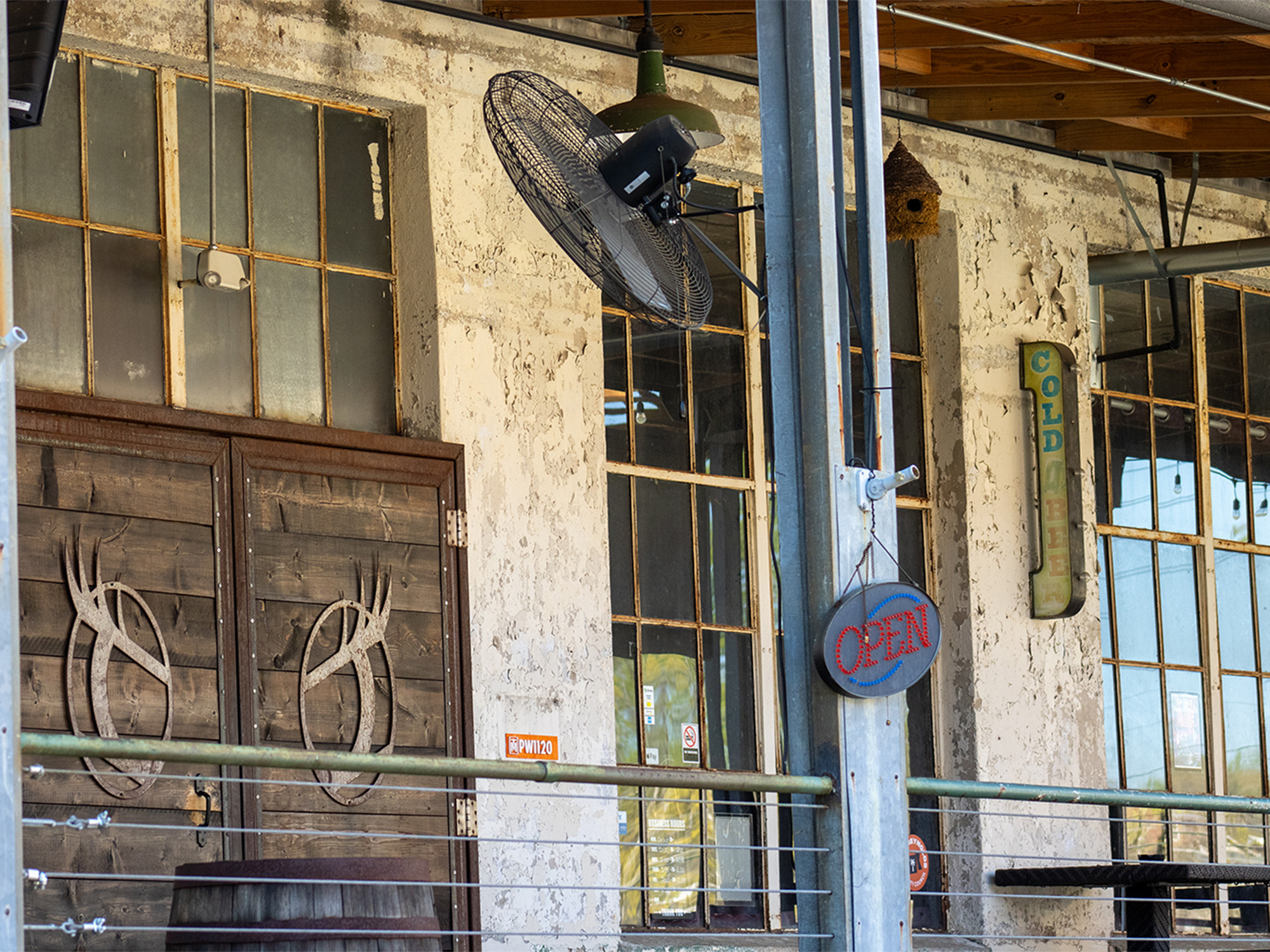 outside seating at old paper mill converted into an arcade
