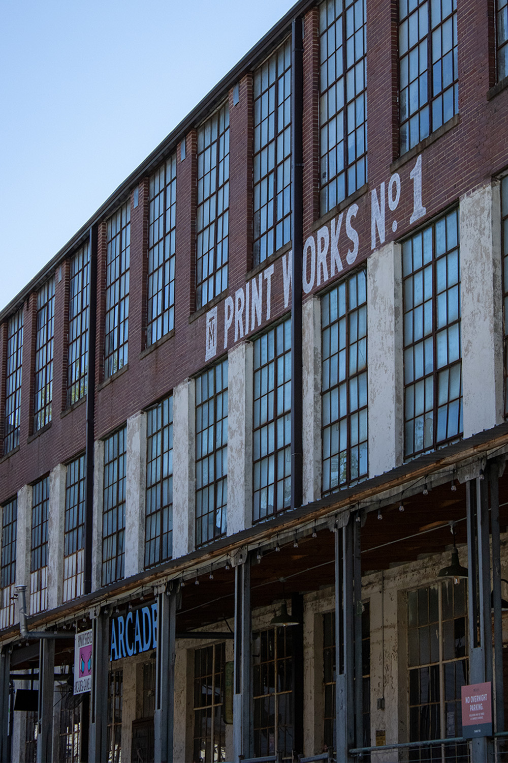 old paper mill with arcade sign